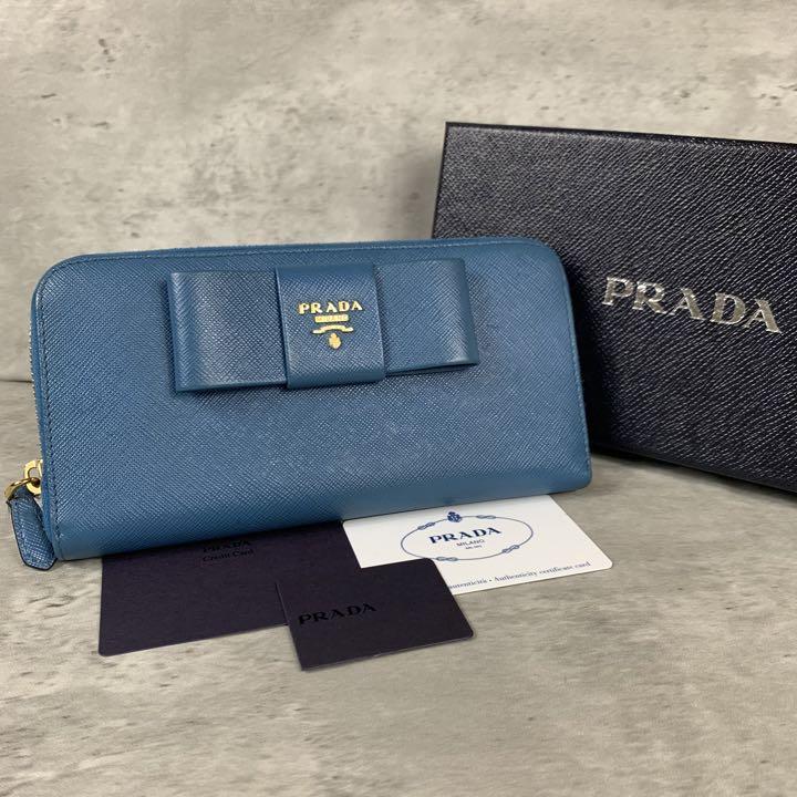 美品】 PRADA 折り財布 ベージュ ロゴ金具 ラウンドファスナー 小物